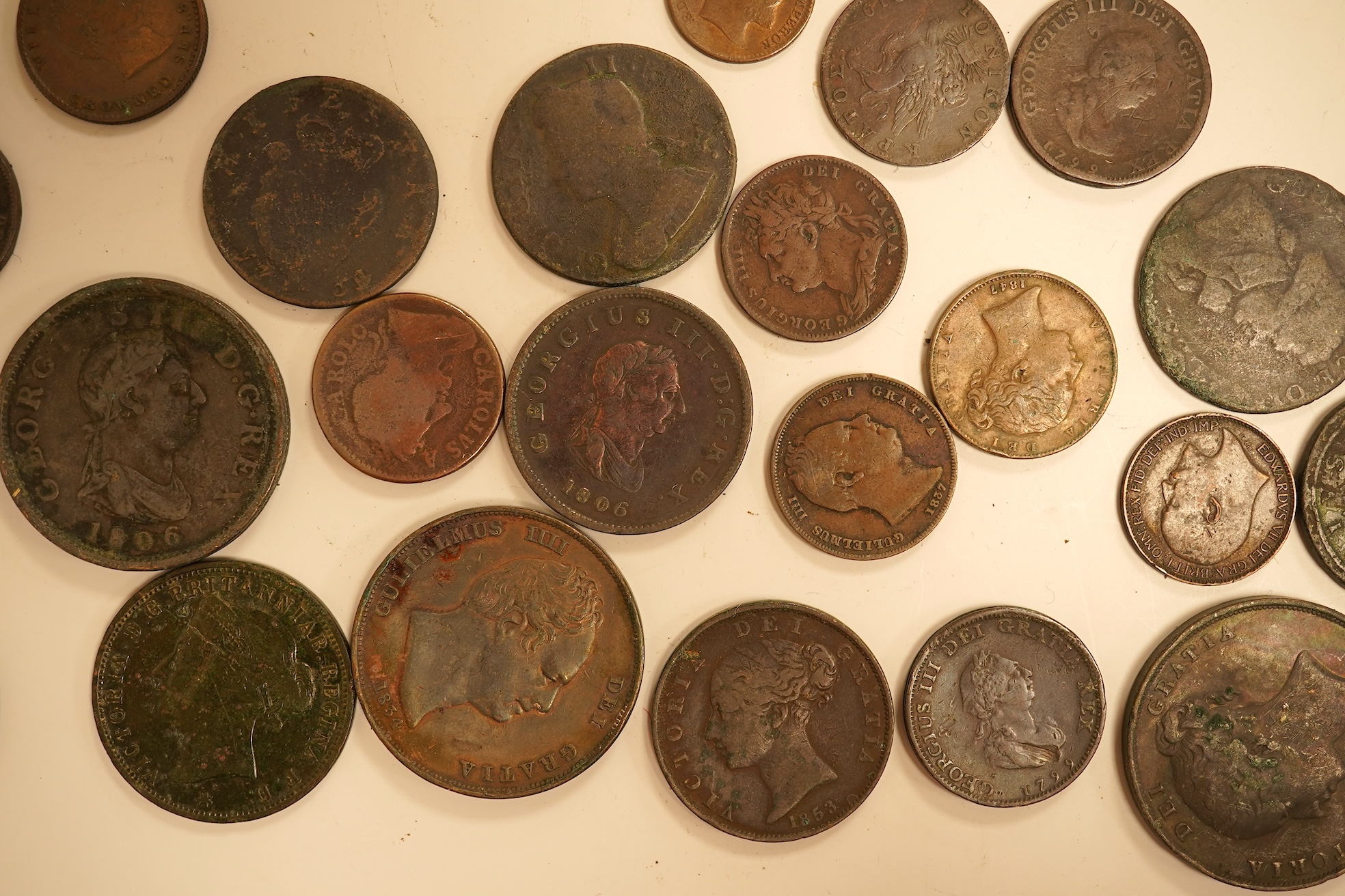 Twenty three copper coins including a William IV penny